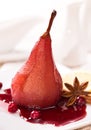 Poached pear with red wine sauce Royalty Free Stock Photo