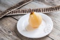 Poached pear in white wine Royalty Free Stock Photo