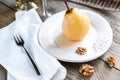 Poached pear in white wine Royalty Free Stock Photo