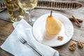 Poached pear in white wine Royalty Free Stock Photo