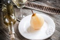 Poached pear in white wine Royalty Free Stock Photo