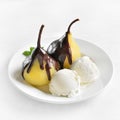 Poached pears with chocolate sauce and ice cream Royalty Free Stock Photo