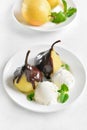 Poached pears with chocolate sauce and ice cream Royalty Free Stock Photo