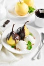 Poached pears with chocolate sauce and ice cream Royalty Free Stock Photo