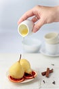 Poached pears in orange syrup Royalty Free Stock Photo