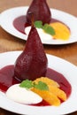 Poached pears with oranges and creme fraiche Royalty Free Stock Photo