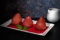 Poached pears in red wine with cinnamon and anise