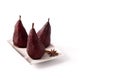 Poached pears in red wine isolated on white background Royalty Free Stock Photo