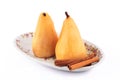 Poached pears in syrop with cinnamon isolated Royalty Free Stock Photo