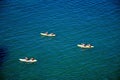 Three kayaks on the ocean, Ponta da Piedade.