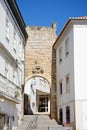 Stone archway in the old town, Tavira.