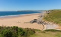 Pobbles beach The Gower Peninsula Wales uk popular tourist destination and next to Three Cliffs Bay in summer Royalty Free Stock Photo