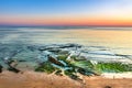 Poca Beach in Estoril, Portugal at Colorful Sunset Royalty Free Stock Photo