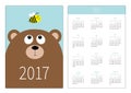 Pocket calendar 2017 year. Week starts Sunday. Flat design Vertical orientation Template. Bear grizzly big head looking at honey Royalty Free Stock Photo