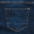 Pocket on classic blue jeans with beautiful stitching. Flat lay Royalty Free Stock Photo