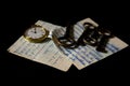 Pocket clock  and keys on an old handwritten sheet Royalty Free Stock Photo