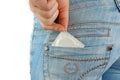 Pocket with condom in hand Royalty Free Stock Photo