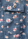Pocket on jeans shirt with flower pattern