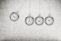 A pocket watch as a swing of the pendulum. Concrete background. 3D rendering. Royalty Free Stock Photo