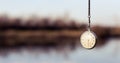 Pocket watch hanging from sky Royalty Free Stock Photo