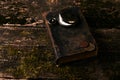 Pocket watch with old antique bible book and retro coins