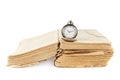 Pocket watch on the old book Royalty Free Stock Photo