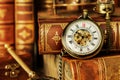 Pocket watch and old books Royalty Free Stock Photo