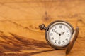 Pocket watch on old map background, vintage style Royalty Free Stock Photo