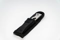 Pocketknife in a black leather case isolated on a white background