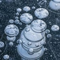 Pockets surrounding the larger bubbles add texture creating a complex Royalty Free Stock Photo