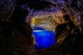 Poco Encantado, blue lagoon with sunrays inside a cavern in the Chapada Diamantina, Andarai, Bahia, Brazil