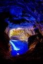 Poco Encantado, blue lagoon with sunrays inside a cavern in the Chapada Diamantina, Andarai, Bahia, Brazil