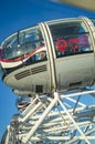 The pod capsule of london eye and people in there enoying with drinks Royalty Free Stock Photo