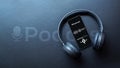 Podcast audio equipment. Audio microphone, sound headphones, podcast application on mobile smartphone screen. Recording Royalty Free Stock Photo