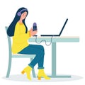 Podcast concept. A young woman sits at a computer with a microphone and headphones indoors on a chair at the table Royalty Free Stock Photo