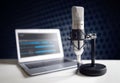 Podcast microphone and laptop computer in recording studio Royalty Free Stock Photo
