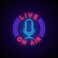 Podcast neon sign. Glowing neon mic icon and text Live, On Air. Royalty Free Stock Photo