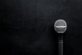 Podcast record with microphone on black background top view space for text