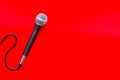 Podcast record with microphone on red background top view space for text