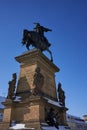 Podebrady, Czech Republic - February 14, 2021 - the equestrian statue of George of Podebrady on Podebrady Square in a beautiful su