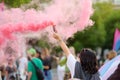 Podgorica, Montenegro - October 8, 2022: Activist woman holding a pink smoke bomb during the Ten Lgbt Pride Parade. Fighting for