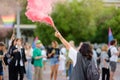 Podgorica, Montenegro - October 8, 2022: Activist woman holding a pink smoke bomb during the Ten Lgbt Pride Parade. Fighting for