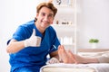 The podiatrist treating feet during procedure Royalty Free Stock Photo