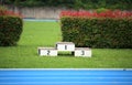 podium of an athletics stadium with numbers one two three Royalty Free Stock Photo