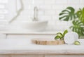 Podium for product display and towel on blurred bathroom background Royalty Free Stock Photo