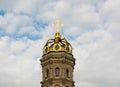 PODOLSK MOSCOW REGION, RUSSIA - JUL 14, 2015: The golden head of Znamenskaia church founded in 1690-1704 in the cloudscape and