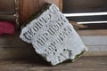 Podporozhye, Arkhangelsk region, Russia, February, 15, 2018. Fragment of old tombstone in Vladimirskaya church in the tract Zhereb Royalty Free Stock Photo