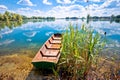 Podravina. Soderica lake wooden boat and water landscape view