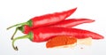 Pods of Chile hot pepper and chili powder in a wooden spoon