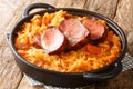 Podvarak Traditional Dish from Balkan Sauerkraut with smoked pork and bacon closeup in the pan. horizontal Royalty Free Stock Photo